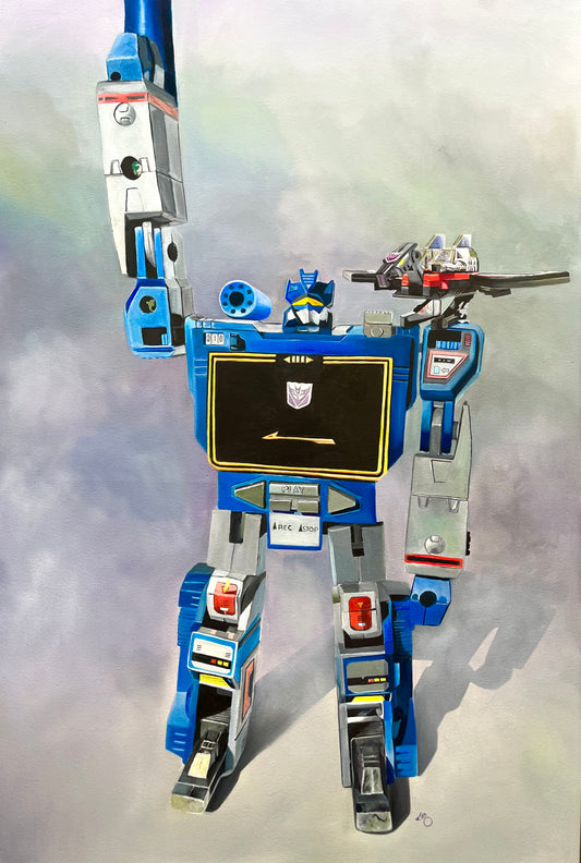 G1 Sound-wave transformer and laserbeak with blue and silver color scheme on a light gray background