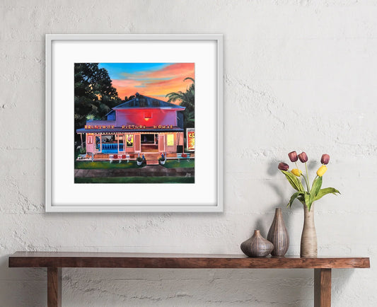 Framed pop art painting of Brunswick Picture House at sunset on modern wall