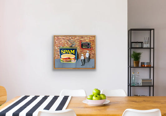 Framed pop art painting of SPAM can on a brick wall, hanging in modern dining room