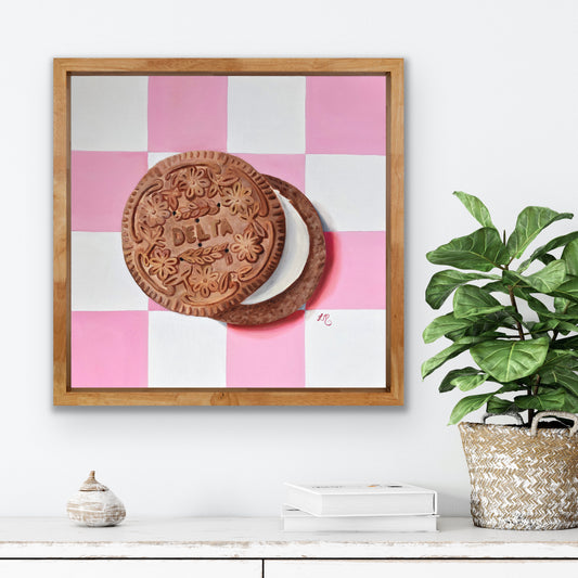 Realistic pop art painting of Delta cream biscuit on pink and white checkered background