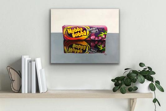 Realistic pop art painting of Hubba Bubba grape bubblegum on canvas, displayed on wall.