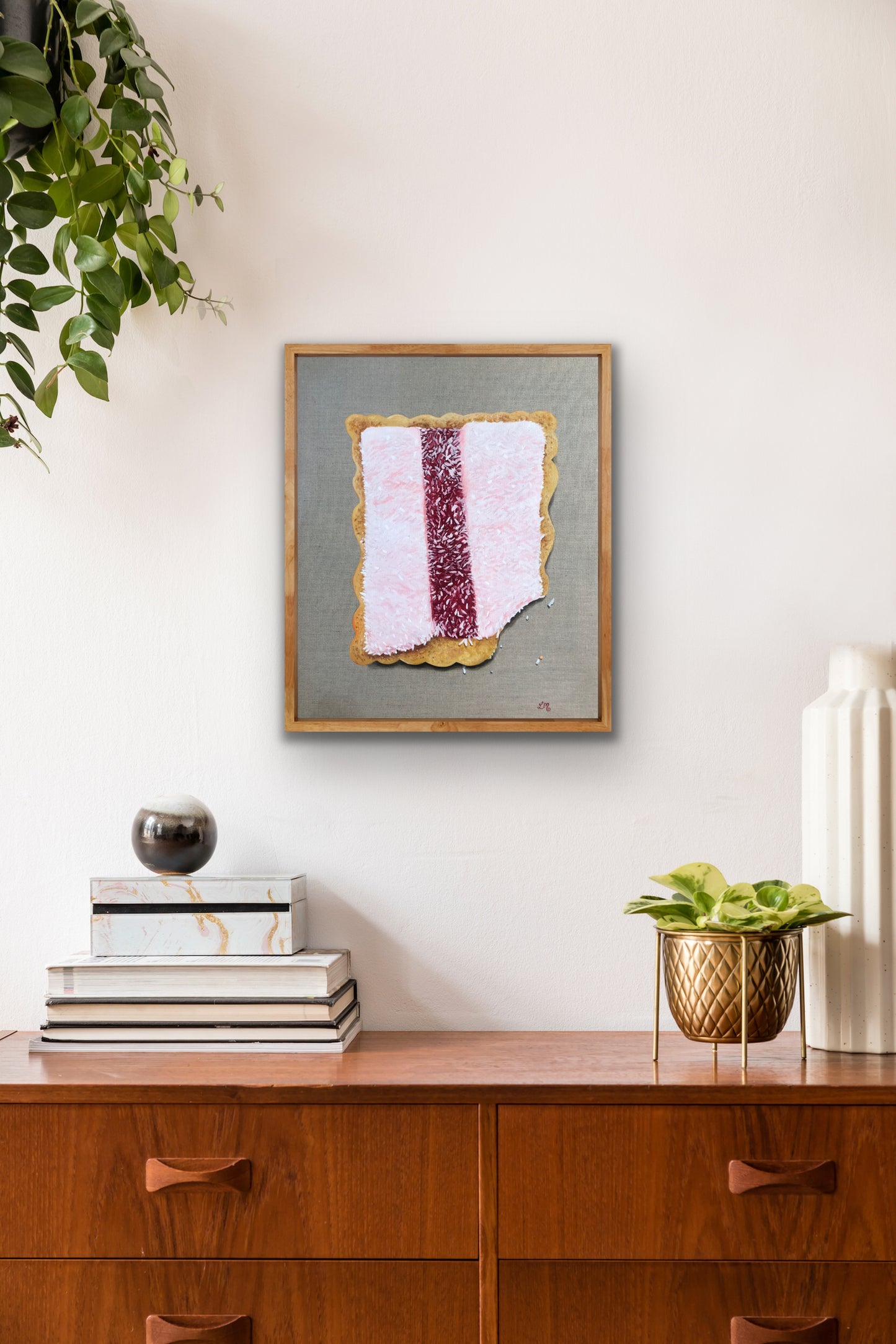 Realistic pop art painting of an Iced VoVo biscuit in a modern home interior setting