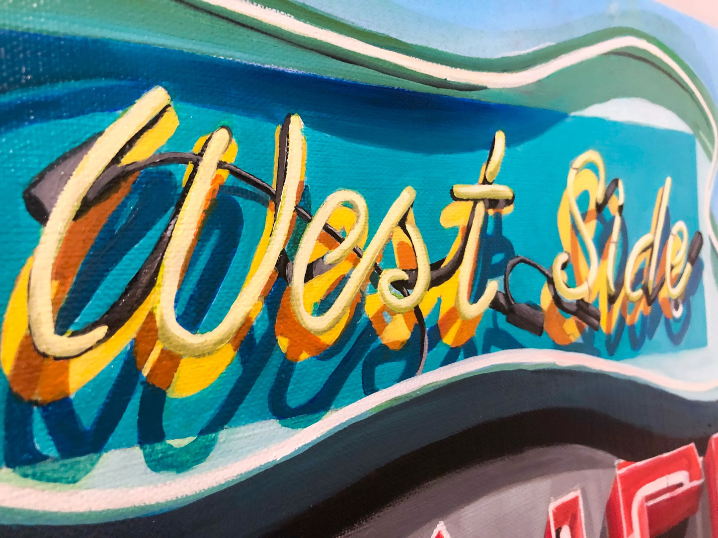Close-up of colorful pop art painting with West Side text in bold retro style.